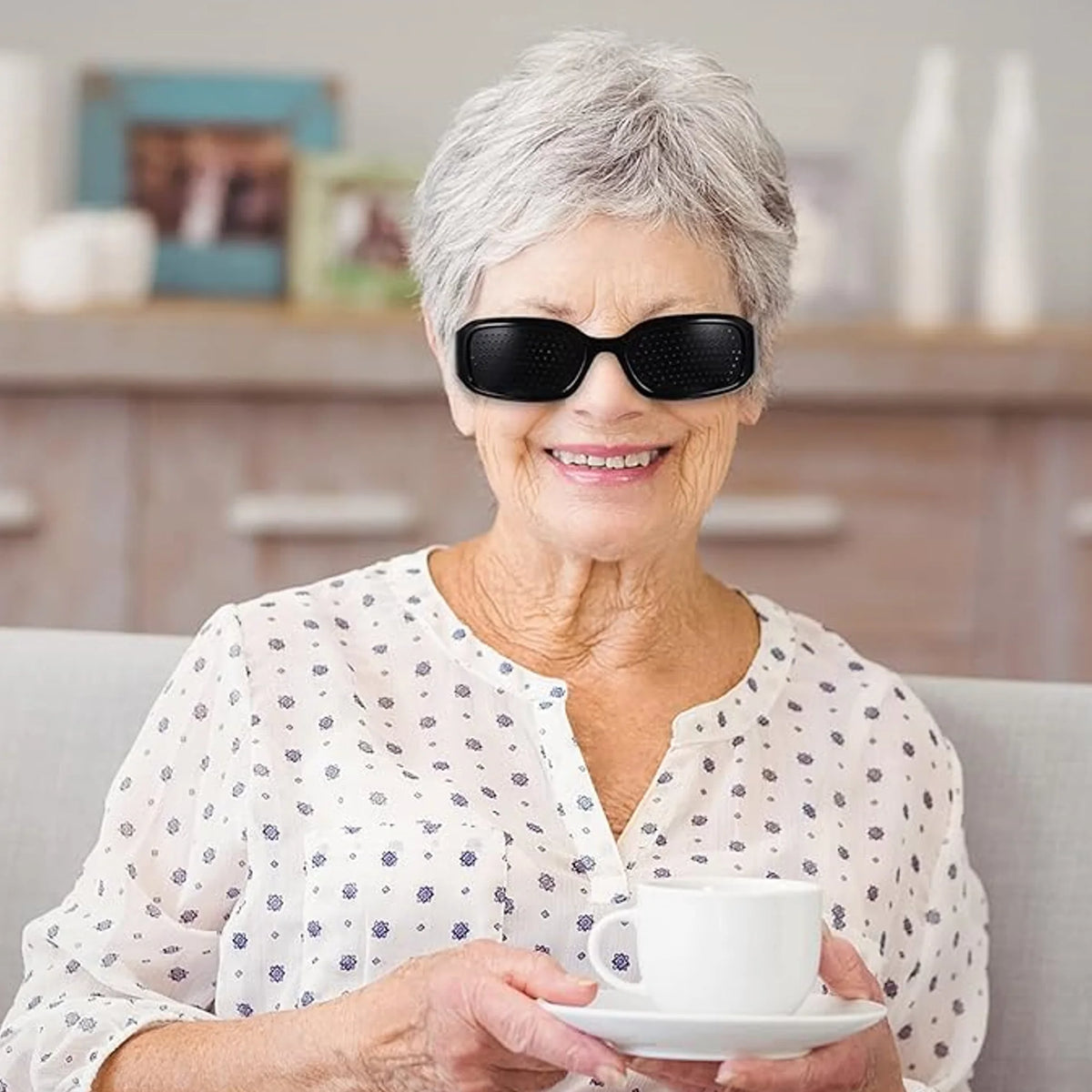 An old woman wearing HopeLens pinhole glasses Sport model.