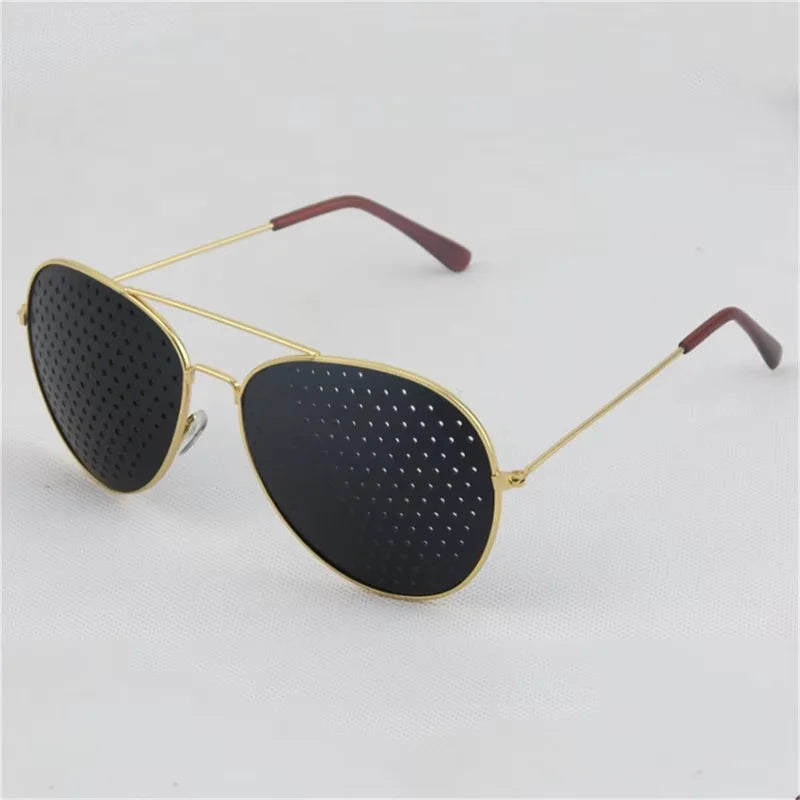 Close up view of HopeLens pinhole glasses Aviator model gold version for vision training.